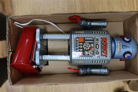 A Horikawa SH, Japan vintage battery-operated Engine Robot and two other robots,